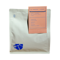 The Pull & Pour Shop Lychee Thermal Shock Washed Castillo coffee bag with peach label and blue logo