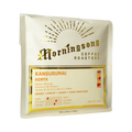 The Pull & Pour Shop Kangurumai Kenya coffee bag with gold foil branding and detailed tasting notes on a peach background