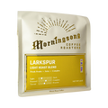 The Pull & Pour Shop Morningsong Coffee Roasters Larkspur light roast whole bean coffee bag in white and yellow.