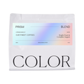 The Pull & Pour Shop Prism Blend whole bean coffee bag with a holographic label featuring fruit and sugar notes.