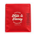 The Pull & Pour Shop Uganda Stancoffee SL-28 light roast coffee bag in vibrant red packaging