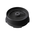 The Pull & Pour Shop AeroPress Flow Control Filter Cap in black plastic with a pressure-actuated valve design.