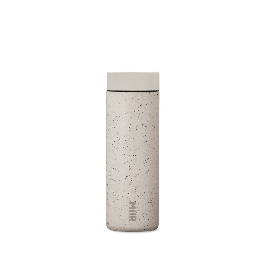 The Pull & Pour Shop MiiR 360 Traveler insulated tumbler in speckled feather gray with a leakproof 360-degree lid.
