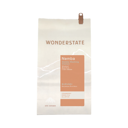 The Pull & Pour Shop Burundi Nemba coffee bag featuring a minimalist cream and terracotta design with flavor notes.