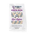 The Pull & Pour Shop Costa Rica Las Lajas Black Honey coffee bag with bee illustrations on a white background