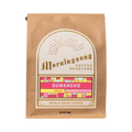 The Pull & Pour Shop Duwancho Ethiopia honey processed whole bean coffee in a brown kraft paper bag with gold label
