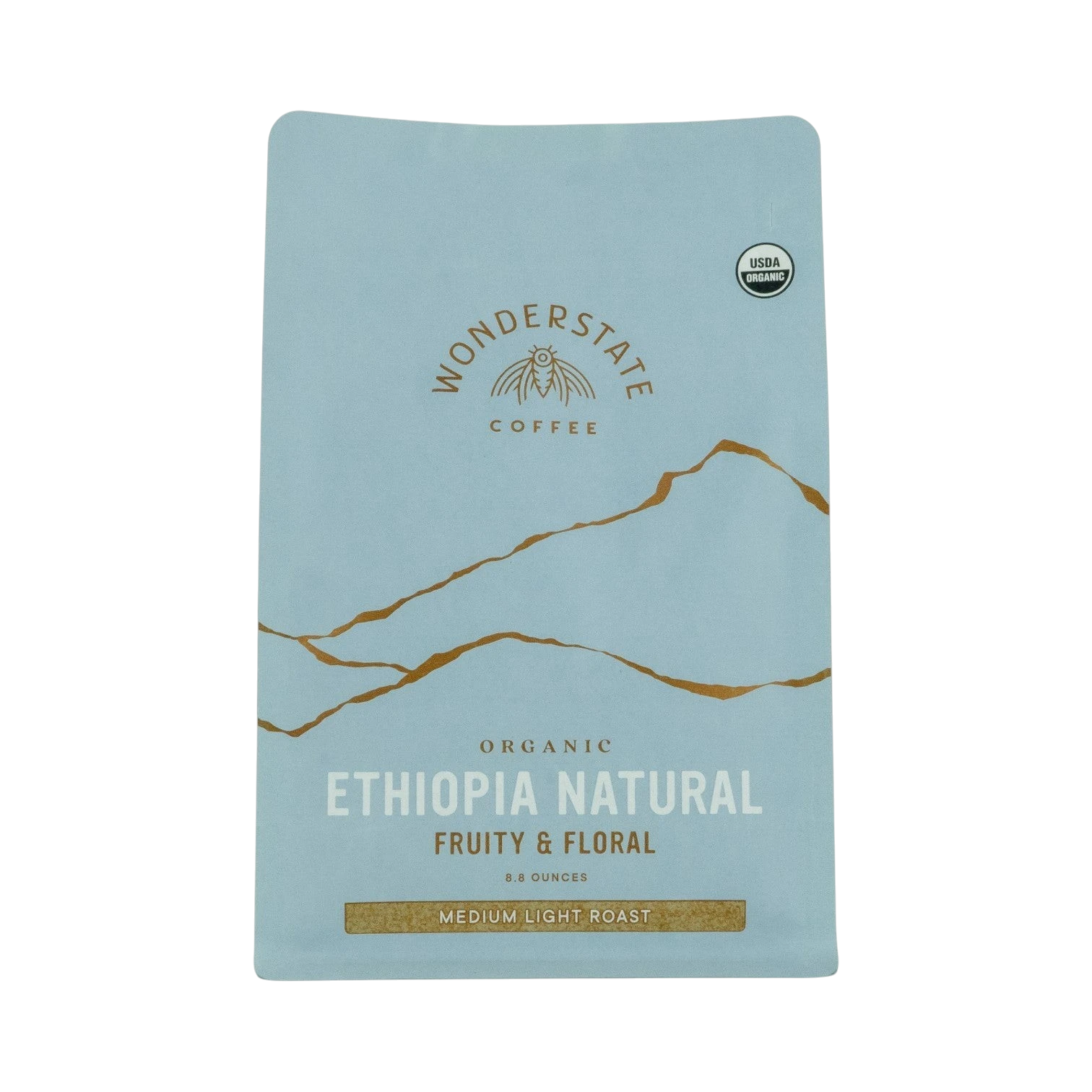 The Pull & Pour Shop organic Ethiopia natural coffee bag in light blue with gold mountain graphic and floral notes.