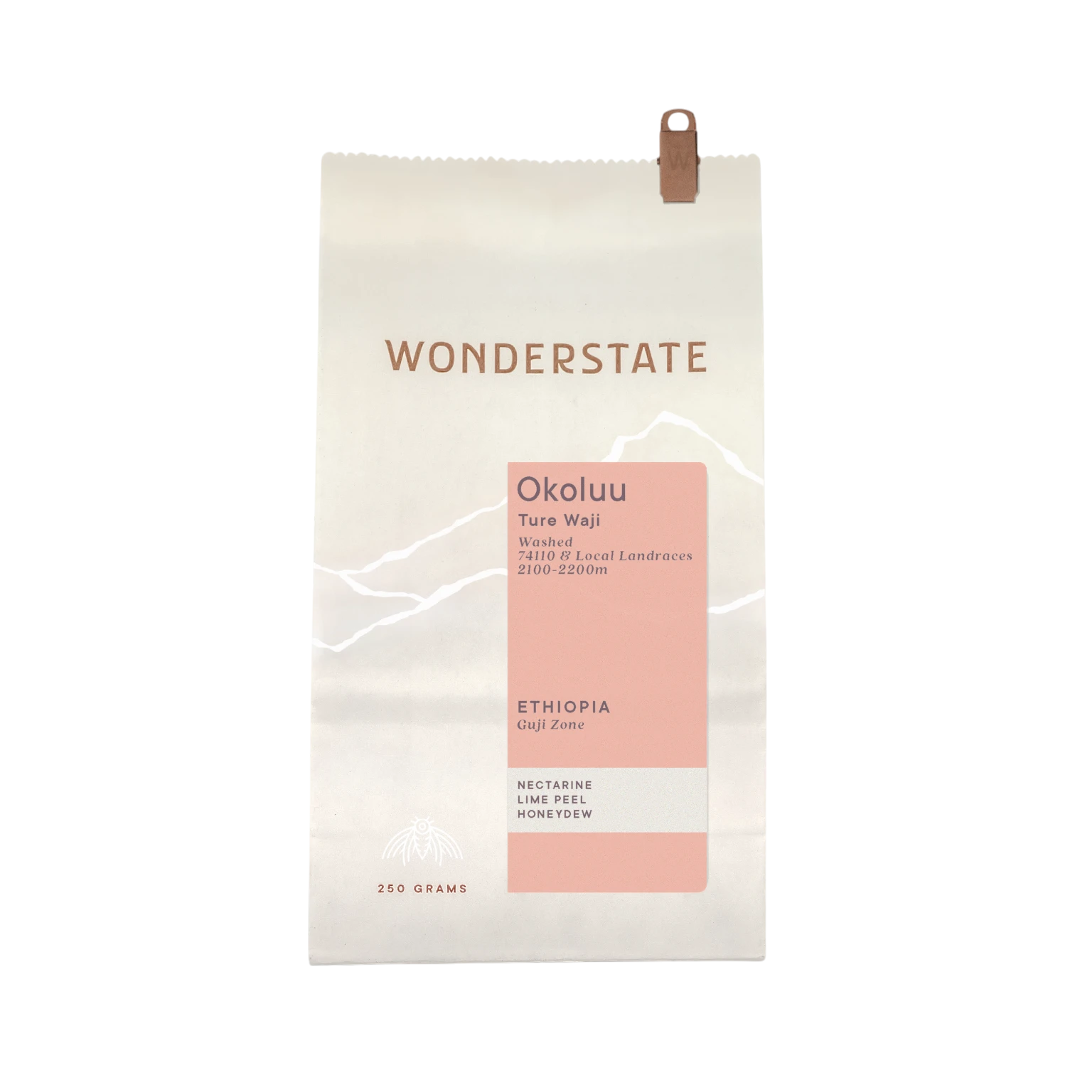 The Pull & Pour Shop Ethiopia Okoluu coffee bag featuring a light cream paper design with a soft pink label.
