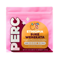 The Pull & Pour Shop Ethiopia Suke Werekata coffee bag in vibrant pink with tropical fruit and nectarine branding.