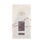 The Pull & Pour Shop Wonderstate Coffee Kenya Gatura AA bag with white packaging and dark purple label details.