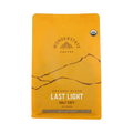 The Pull & Pour Shop Last Light half-caff organic coffee bag in yellow packaging with medium roast label