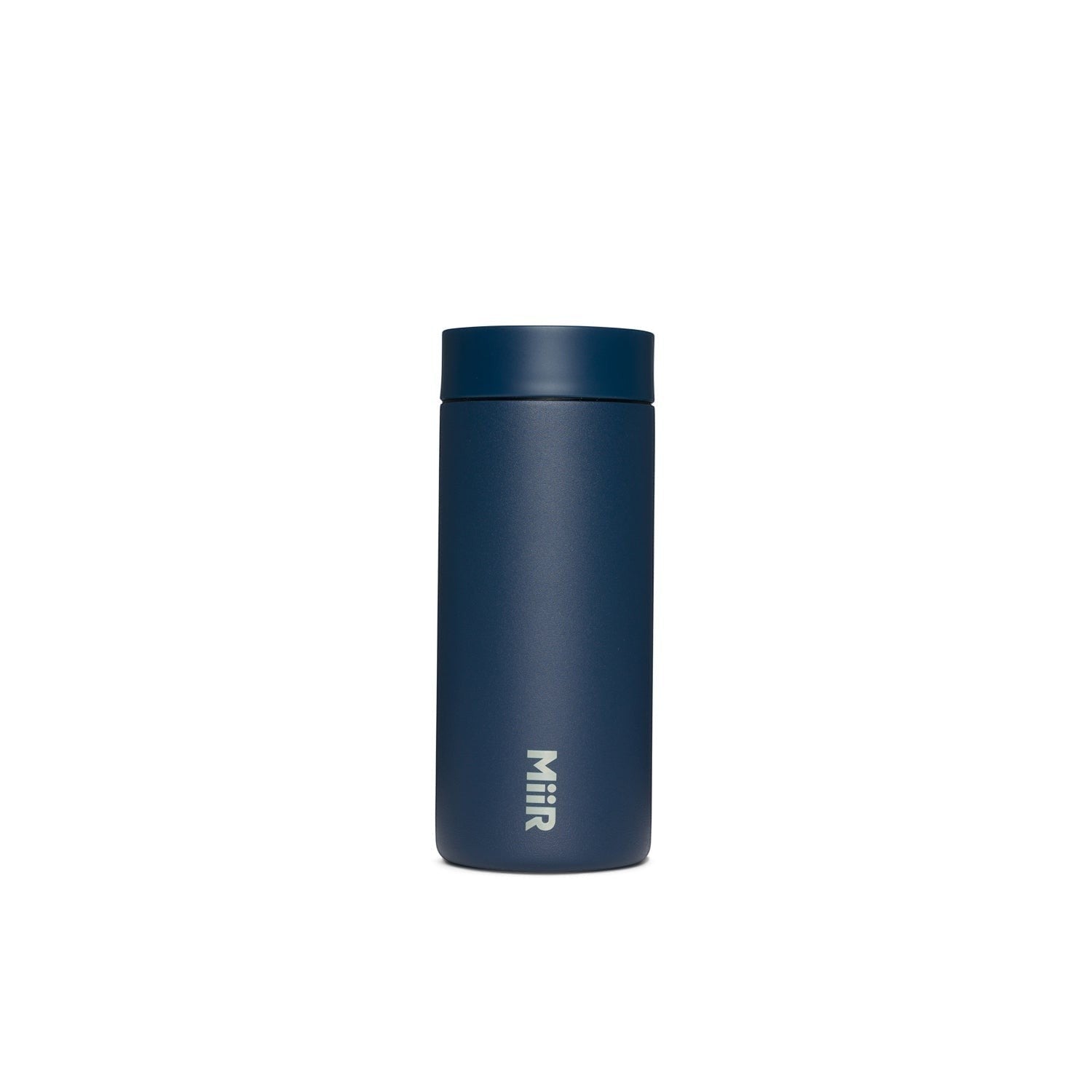 The Pull & Pour Shop MiiR 360 Traveler insulated navy blue travel tumbler with a leakproof 360-degree lid.