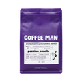 The Pull & Pour Shop Coffee Man Passion Punch experimental light roast coffee bag in purple packaging