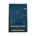The Pull & Pour Shop Wonderstate Coffee Organic Star Valley Decaf bag with blue packaging and gold mountain graphic.